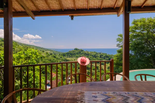 Open-air living terrace with ocean view